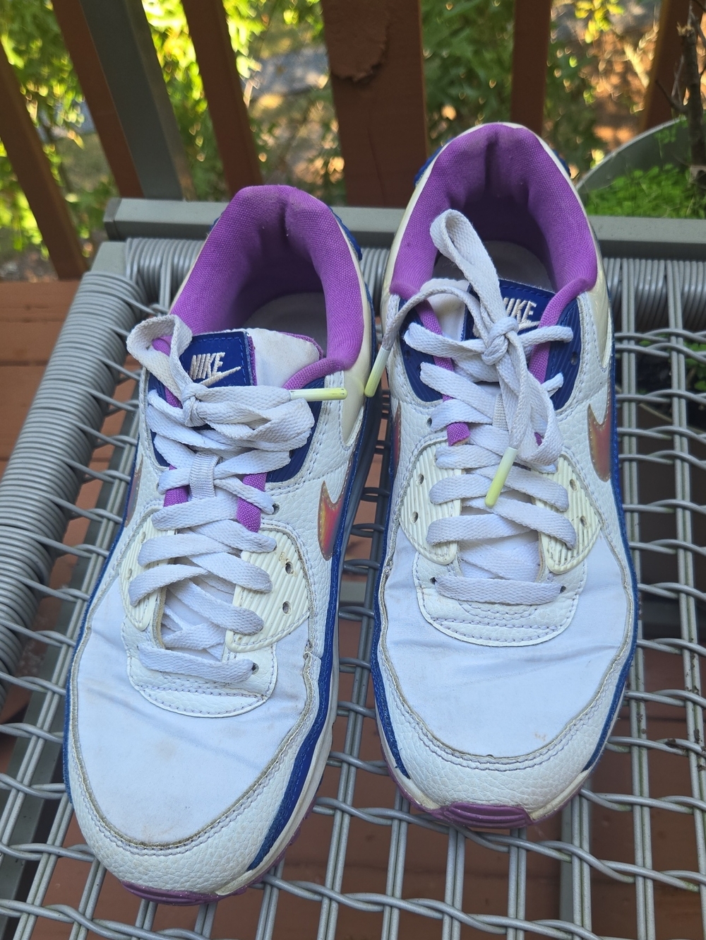 Nike White Sneakers with Purple Accents and Iridescent Swoosh